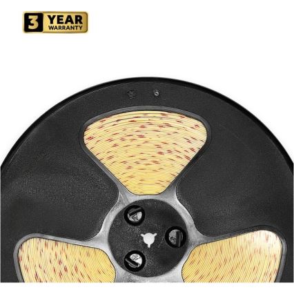 Cievka so svetložltou páskou s červenými bodkami je navinutá na čiernej cievke s trojramenným držiakom. Na obrázku je aj označenie „3 YEAR WARRANTY“.