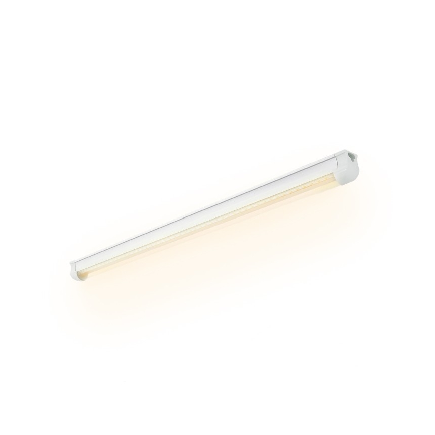 LED svietidlo svieti na bielom pozadí. Svietidlo je dlhé, biele, obdĺžnikového tvaru s bielymi koncovkami. Je pripevnené k stene alebo stropu.
