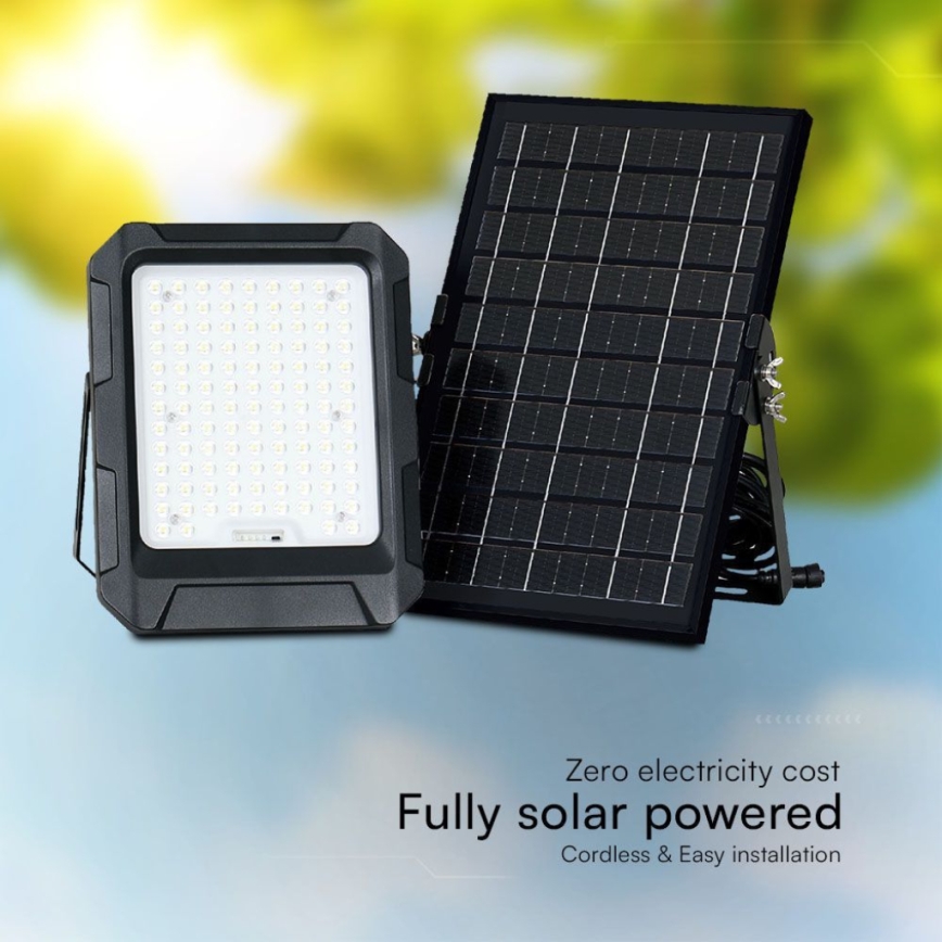 Solárny LED reflektor s mnohými diódami je umiestnený vedľa solárneho panelu. Súčasťou je kábel spájajúci reflektor a panel. Text pod obrázkom uvádza: Nulové náklady na elektrinu. Plne solárne napájané. Bezdrôtové a jednoduchá inštalácia.