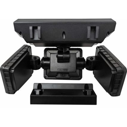 Solárny svietidlo s dvoma pohyblivými hlavicami je rozložené na jednotlivé diely. Vidno solárny panel, dve svietidlové hlavy, montážnu dosku a stredovú časť s vypínačom „ON/OFF“.