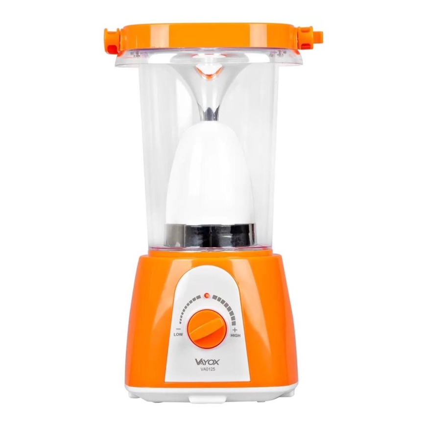 Oranžová prenosná LED lampa s plastovým telom svieti. Na spodku je otočný prepínač s označením „LOW“ a „HIGH“. Na spodku je viditeľné logo „VAYOX VA0125“.