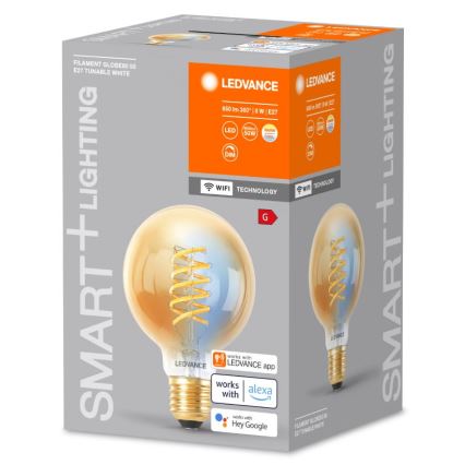 LED žiarovka s vláknom v tvare špirály je zabalená v krabici. Krabica uvádza technické parametre: 850 lm 360°, 8 W, E27, a kompatibilitu s aplikáciou LEDVANCE, Alexou a Google Assistant.