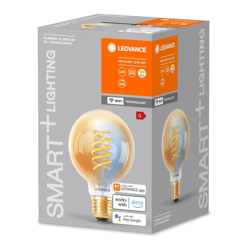 LED žiarovka s vláknom v tvare špirály je zabalená v krabici. Krabica uvádza technické parametre: 850 lm 360°, 8 W, E27, a kompatibilitu s aplikáciou LEDVANCE, Alexou a Google Assistant.
