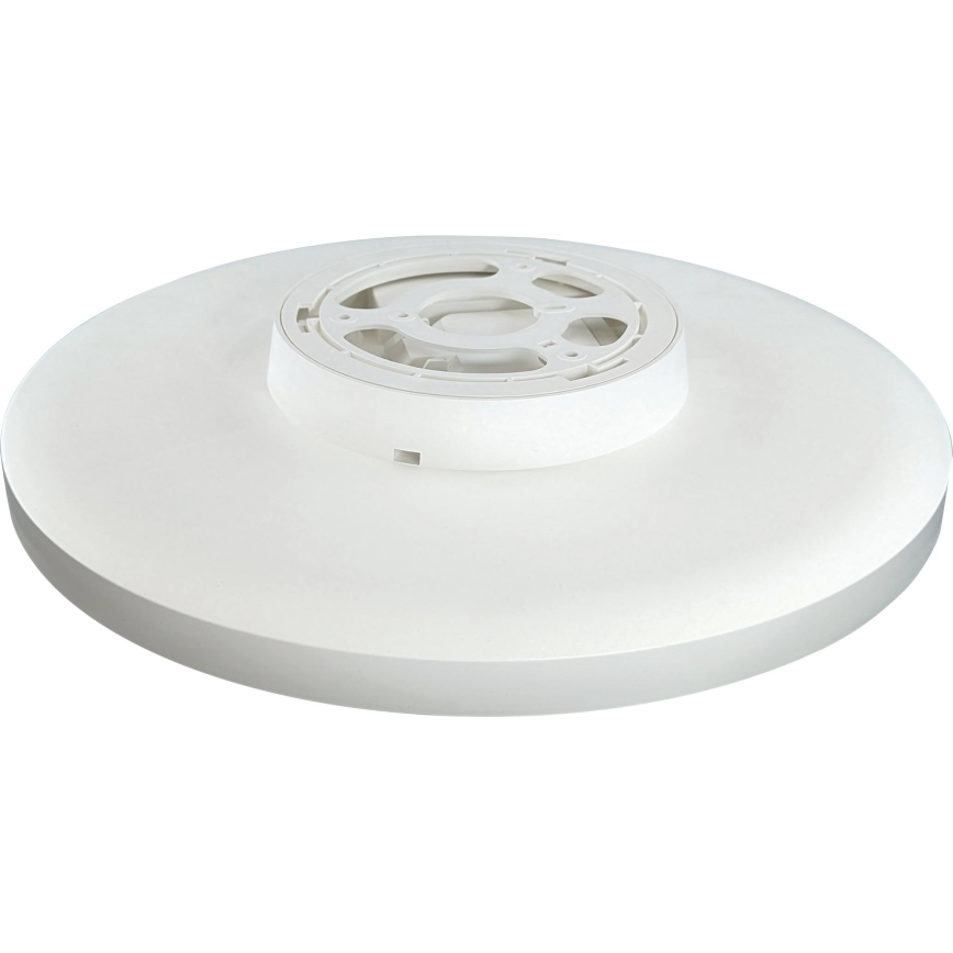 Biela kruhová stropná lampa je zobrazená zhora. Vidieť jej hornú časť s montážnym mechanizmom. Pozadie je biele.