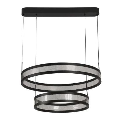 Dvojité kruhové svietidlo visí zo stropu. Svietidlo má dva prekrývajúce sa kruhy z čierneho kovu s priesvitnými vložkami. Vložky sú textúrované, s jemnou zrnitou štruktúrou. Svietidlo je zavesené na troch tenkých kábloch pripevnených k čiernej stropnej konzole.