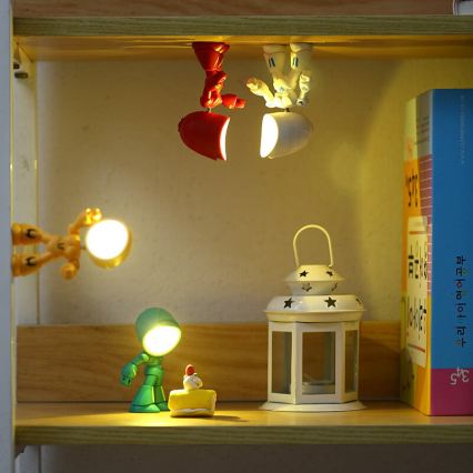 LED stolná lampa LED/0,06W/3xLR41 robot žltá