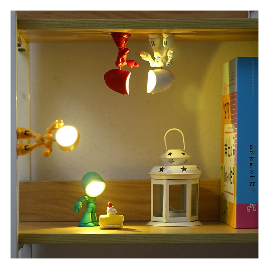 LED stolná lampa LED/0,06W/3xLR41 robot žltá