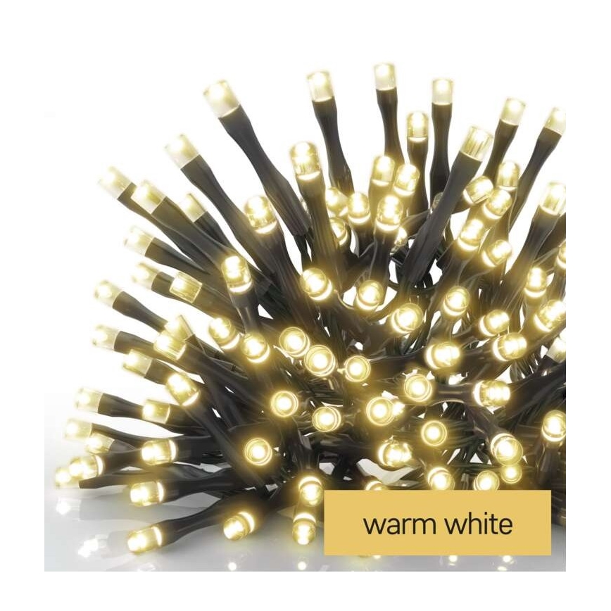 LED svetelný pás s mnohými žiarovkami s teplým bielym svetlom (warm white) je zvinutý. Káble sú čierne.