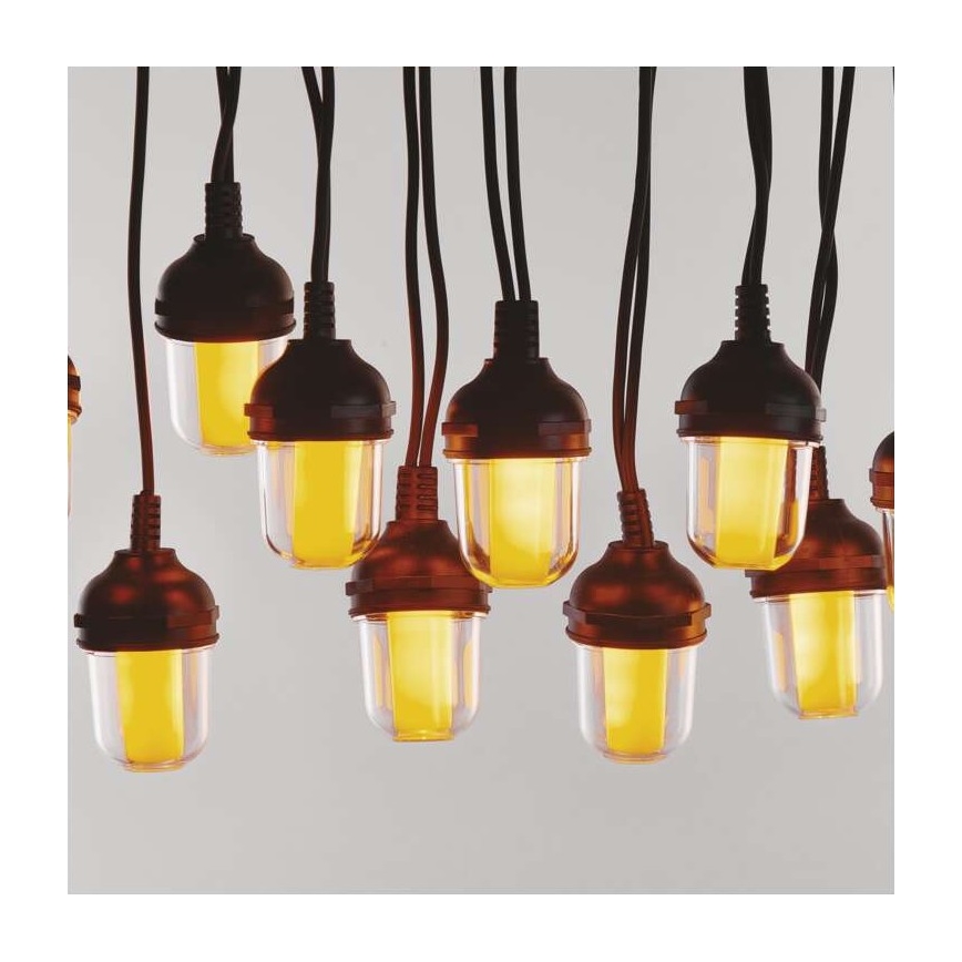 Viaceré hnedé závesné LED lampy s teplým žltým svetlom visia z čiernych káblov. Lampy sú umiestnené blízko seba.