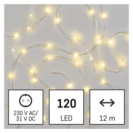 Svetelný reťaz s 120 LED diódami svieti na svetlom pozadí. Dĺžka reťazca je 12 metrov, napájanie 230 V AC/31 V DC.