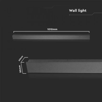 Dlhá, tmavá nástenná lampa (Wall light) s rozmermi 1010 mm x 60 mm x 50 mm je zobrazená na tmavom pozadí.