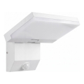 LED vonkajšie nástenné svietidlo s pohybovým senzorom LED/18W/230V IP44 biela