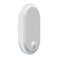 LED Vonkajšie nástenné svietidlo so snímačom pohybu a súmraku OVAL LED/10W/230V IP65 biela