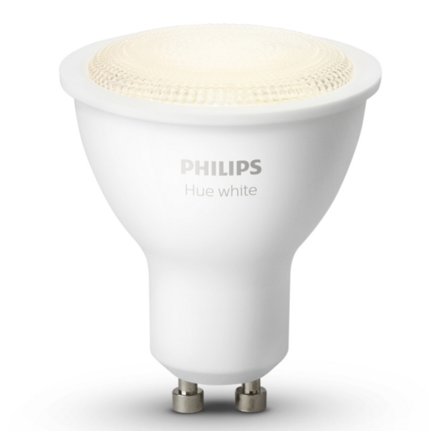 LED žiarovka Philips Hue white svieti. Je biela, s mierne teplým svetlom na vrchu. Na tele je vyrazené PHILIPS Hue white.