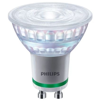 LED žiarovka Philips svieti. Má priehľadný vrch a strieborný spodok s nápisom „PHILIPS“ a zeleným prstencom. Je umiestnená na bielom pozadí.