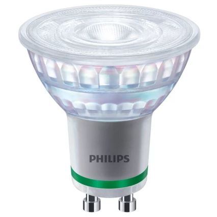LED žiarovka Philips svieti. Je guľatého tvaru, s priehľadnou hornou časťou a strieborným telom. Na spodku je zelený prúžok a nápis PHILIPS.