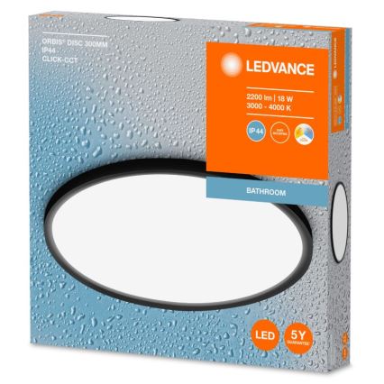Oválne LED svietidlo pre kúpeľňu s čiernym rámom je zobrazené na obale. Svietidlo má parametre: 2200 lm, 18 W, 3000-4000 K, IP44. Balenie je na modrom pozadí s kvapkami vody.
