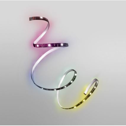 LED pásik sa vlní proti svetlému pozadiu. Pásik vyžaruje viacfarebné svetlo, postupne prechádza od fialovej, cez zelenú až po žltú.