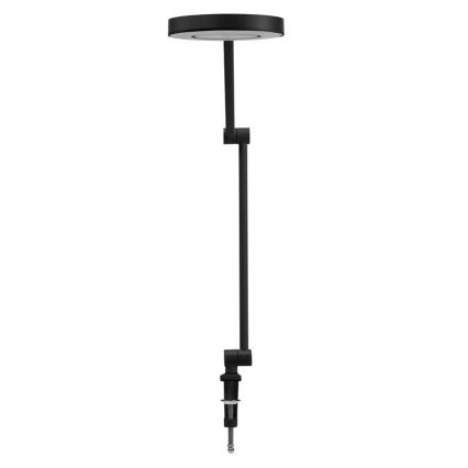 Čierna stolová lampa s okrúhlou hlavou je pripevnená k podložke pomocou kĺbového ramena. Lampa je umiestnená na bielom pozadí.