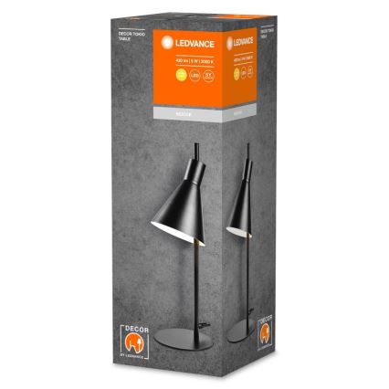 Čierna stolová lampa s kužeľovitým tienidlom je zobrazená na obale. Balenie uvádza: 420 lm, 5 W, 3000 K, LED, 5Y. Názov výrobku: DECOR Tokio.