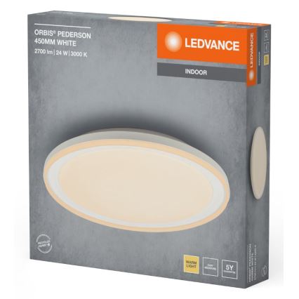 Oválny LED stropný svietidlo, s dvojitým okrajom, je zobrazené v balení. Balenie uvádza: ORBIS® PEDERSON 450MM WHITE, 2700 lm | 24 W | 3000 K, LEDVANCE, INDOOR, WARM LIGHT, 5Y záruka.