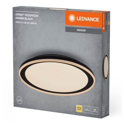 Oválny stropný LED svietidlo s čiernym a zlatým rámom je zobrazené na obale. Balenie uvádza: ORBIS® PEDERSON 550MM BLACK, 4700 lm | 36 W | 3000 K, LEDVANCE, INDOOR.