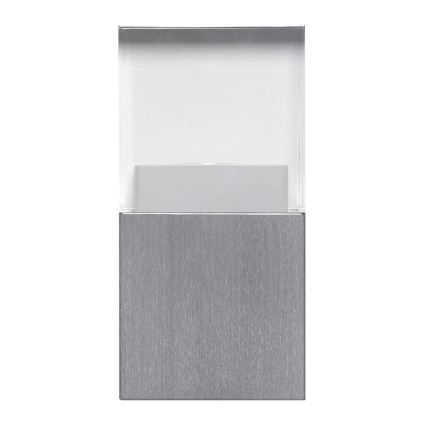 Svietidlo je umiestnené na stene. Skladá sa z kovového, strieborného podstavca a priehľadnej vrchnej časti. Svietidlo svieti.