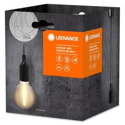 Závesné svietidlo LEDVANCE Vintage 1906 Pendulum Bell je zobrazené v obale. Balenie je tmavosivé, s oranžovým štítkom uvádzajúcim názov produktu, typ objímky E27, maximálny výkon 15W LED a 5-ročnú záruku. Žiarovka nie je súčasťou balenia.