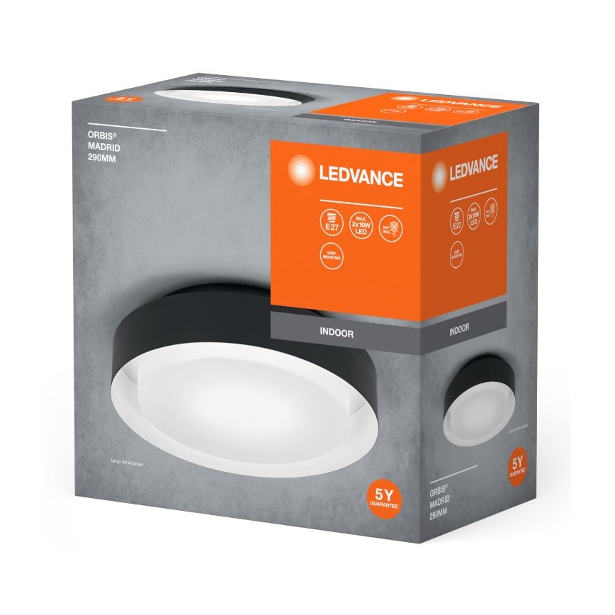 Oválne LED svietidlo s čiernym rámom a bielym difúzorom je zobrazené v balení. Balenie uvádza: LEDVANCE, Orbis Madrid 290mm, E27, max. 2x10W LED, Indoor, 5-ročná záruka.