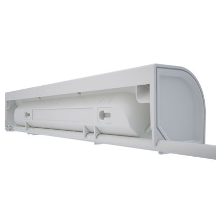 Dlhý, svetlosivý valec je umiestnený vo vnútri väčšej, rovnakej sivej konštrukcie. Celok pripomína časť dopravného prostriedku, umiestnený na bielom pozadí.