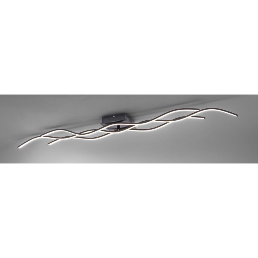 Svietidlo s LED osvetlením je pripevnené k stropu. Jeho tri vlnovité ramená vyžarujú svetlo. Konštrukcia je tmavosivá.