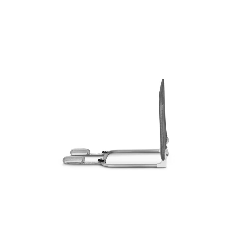 Zvýšený podhlavník je zložený. Skladá sa z kovového rámu a tmavosivej opierky. Nachádza sa na bielom pozadí.