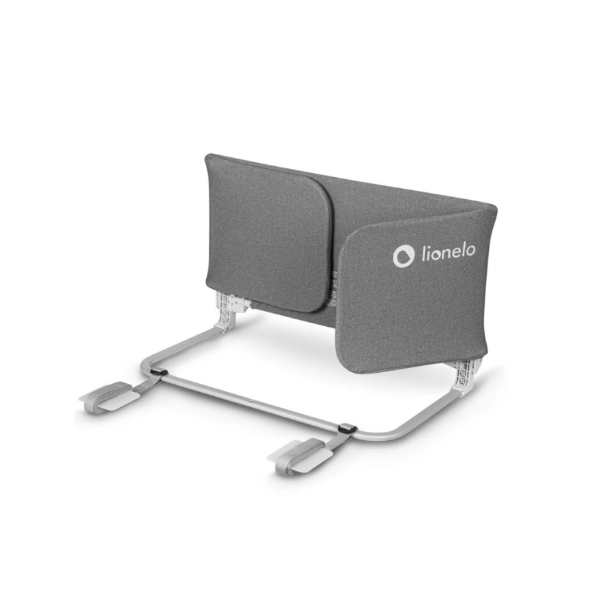 Ochranná zábrana pre detskú postieľku, šedá, s kovovou konštrukciou a popruhmi na upevnenie. Na bočnej strane je logo: lionelo.