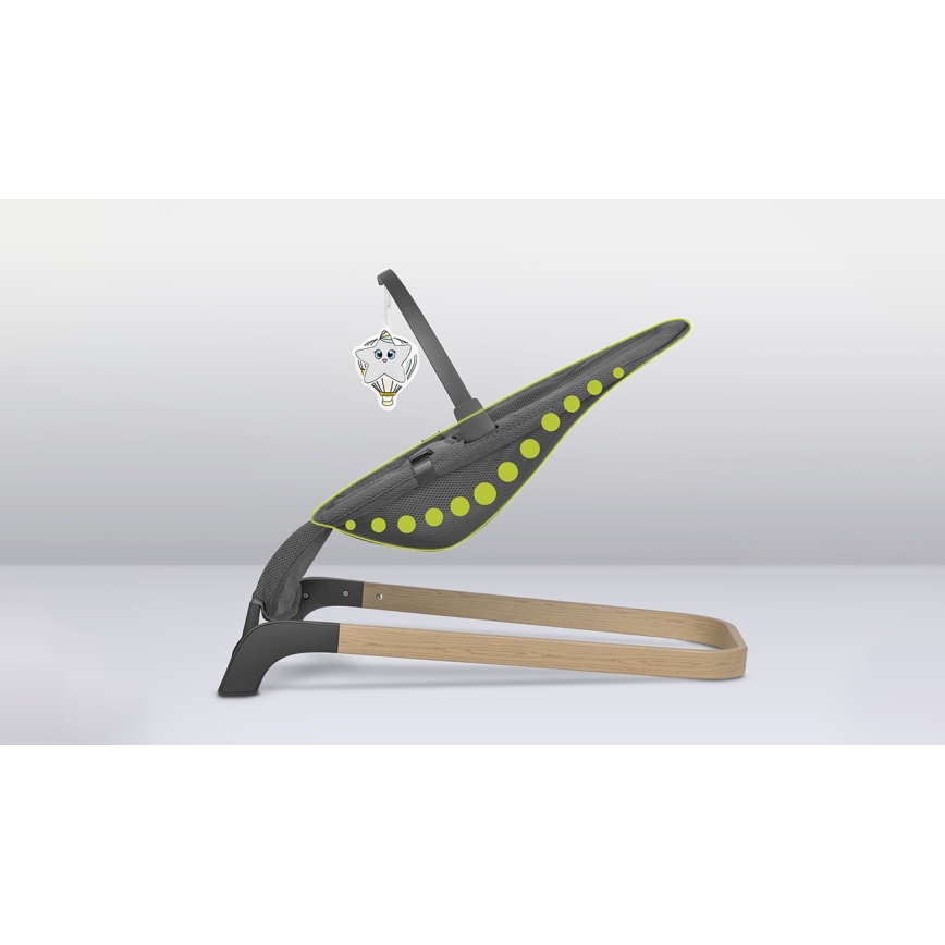 Hojdačka pre bábätká je naklonená. Má sivú látkovú časť s limetkovozelenými bodkami a drevenú konštrukciu. Zavesená je hračka v tvare balónu s obrázkom hviezdy.