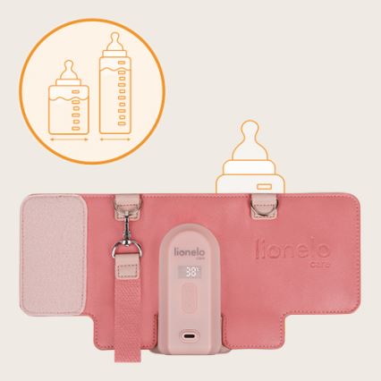 Ružová prenosná ohrievačka na fľaše Lionelo Care s displejom ukazujúcim 38°C, má nastaviteľný popruh a je určená na ohrievanie detských fliaš rôznych veľkostí.