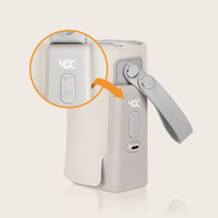 Prehrievač fľašiek zobrazuje teplotu 40°C. Má tlačidlá na ovládanie a USB-C port. Je zabalený v béžovom puzdre s popruhom.
