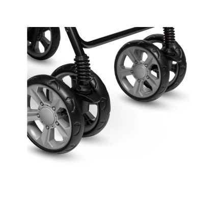 Kočík s dvoma pármi kolies s pružením stojí na bielom pozadí. Kolesá sú šedé a čierne, s výrazným dezénom.