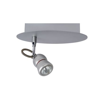 Svietidlo svieti. Je pripevnené k stropnej doske. Doska je okrúhla a striebornej farby.