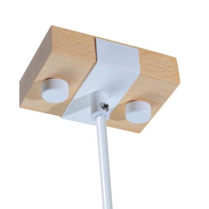Drevená stropná montáž s bielym držiakom a tyčou sa pripevňuje k stropu. Montáž je doplnená o dva biele plastové prvky.