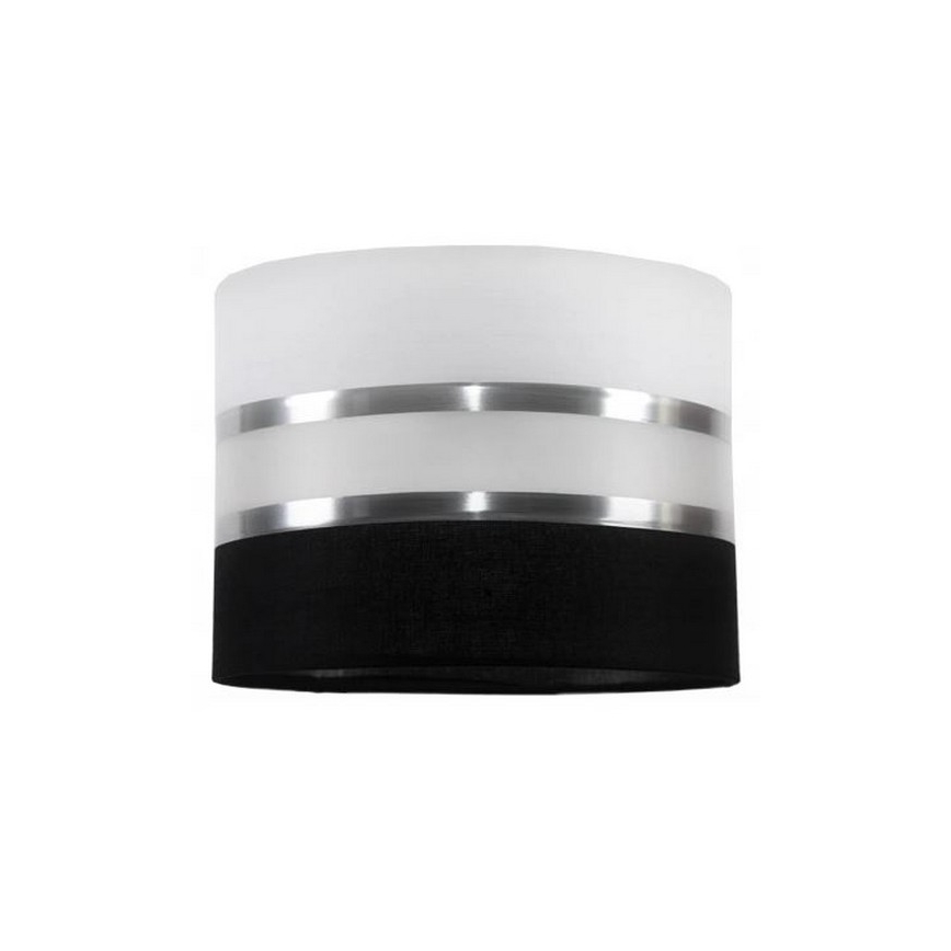 Cylindrický tienidlo na lampu je zdobené dvoma striebornými pásikmi a čiernym spodkom. Tienidlo je umiestnené samostatne.