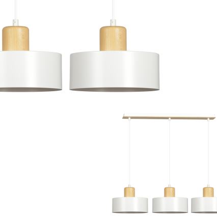 Dve a trojica bielych závesných lámp s dreveným detailom visia samostatne a na spoločnej drevenej lište. Lampa má valcový tienidlo.