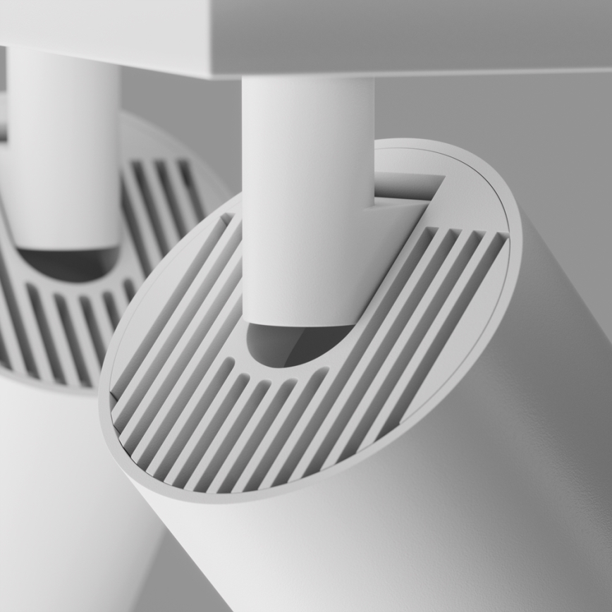 Svietidlo s valcovým telom je pripevnené k stropu. Jeho vrchná časť má mriežku pre odvetrávanie. Svietidlo je biele a je súčasťou súpravy viacerých rovnakých svietidiel.