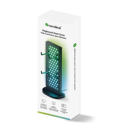 Stojan na stôl s podsvietením Nanoleaf Pegboard Desk Dock stojí na stole. Má háčiky na drôty a podsvietenie. Balenie uvádza názov produktu v angličtine a francúzštine.