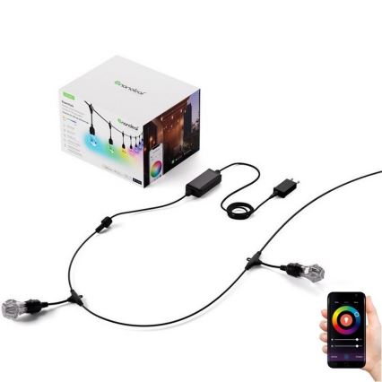 Inteligentný svetelný systém Nanoleaf Essentials je zobrazený s dvoma LED žiarovkami, napájacím zdrojom a ovládaním cez mobilnú aplikáciu. Systém je pripojený k sieti a je zabalený v krabici s obrázkom inštalácie.