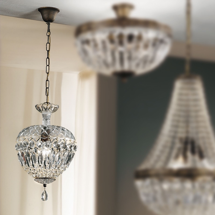 Krištáľový luster na reťazi ARILA 1xE27/60W/230V pr. 25 cm hnedá/patina