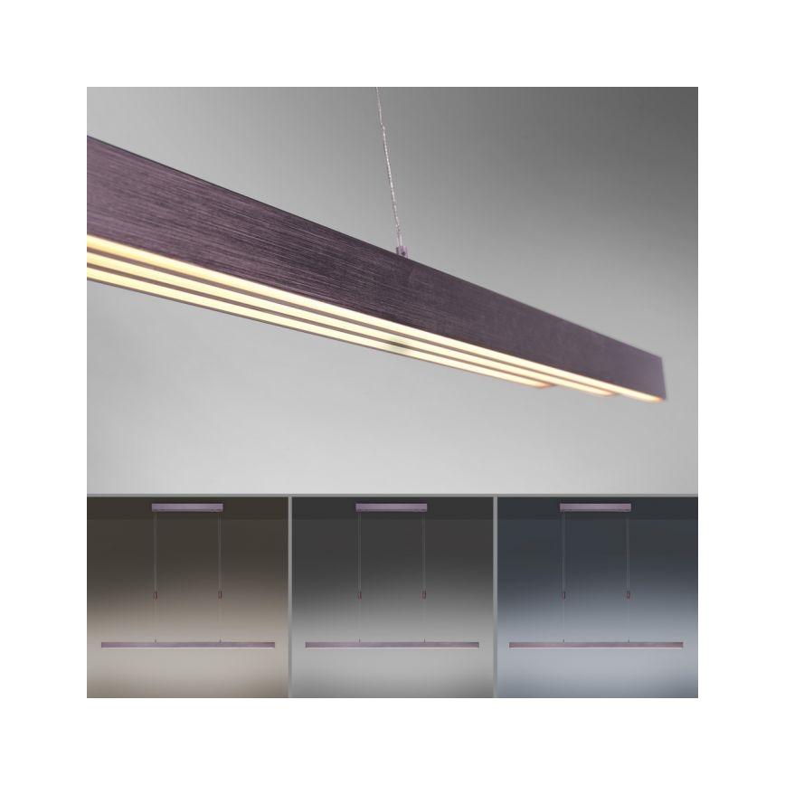 Dlhá obdĺžniková LED lampa visí zo stropu. Svieti dvoma svetlami. Na obrázku sú znázornené tri farebné varianty lampy.