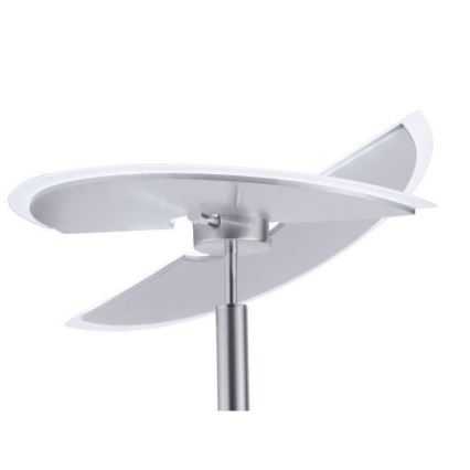 Stolová lampa s dvoma asymetrickými tienidlami z matného kovu a mliečneho skla je umiestnená na kovovej nohe. Tienidlá sú pripevnené k stĺpiku.