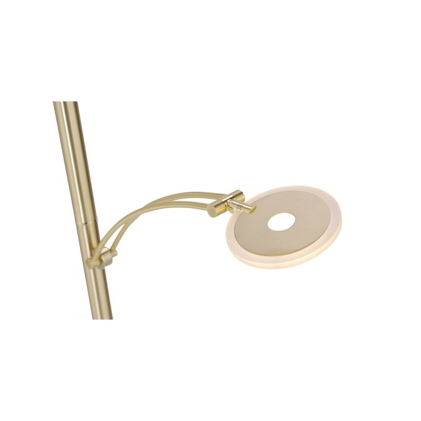 Stojacia lampa so zlatou kovovou konštrukciou a kruhovou LED hlavicou svieti. Hlavice je pripojená k dlhému rameni, ktoré je pohyblivé.