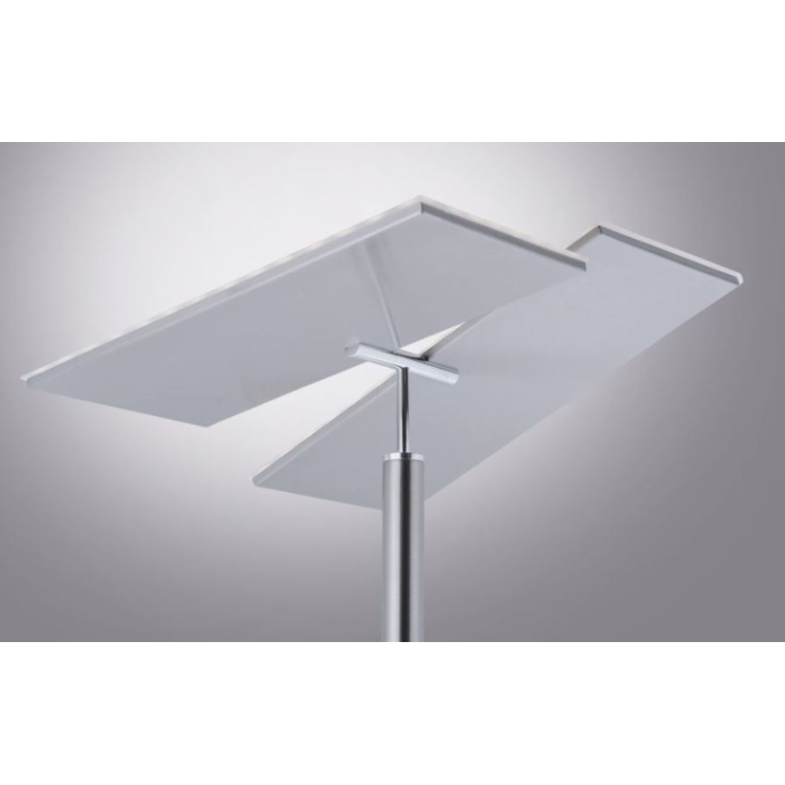 Stropná lampa s dvoma obdĺžnikovými tienidlami spojenými krížovým prvkom na kovovej tyči, svetlo sa odráža od tienidiel.