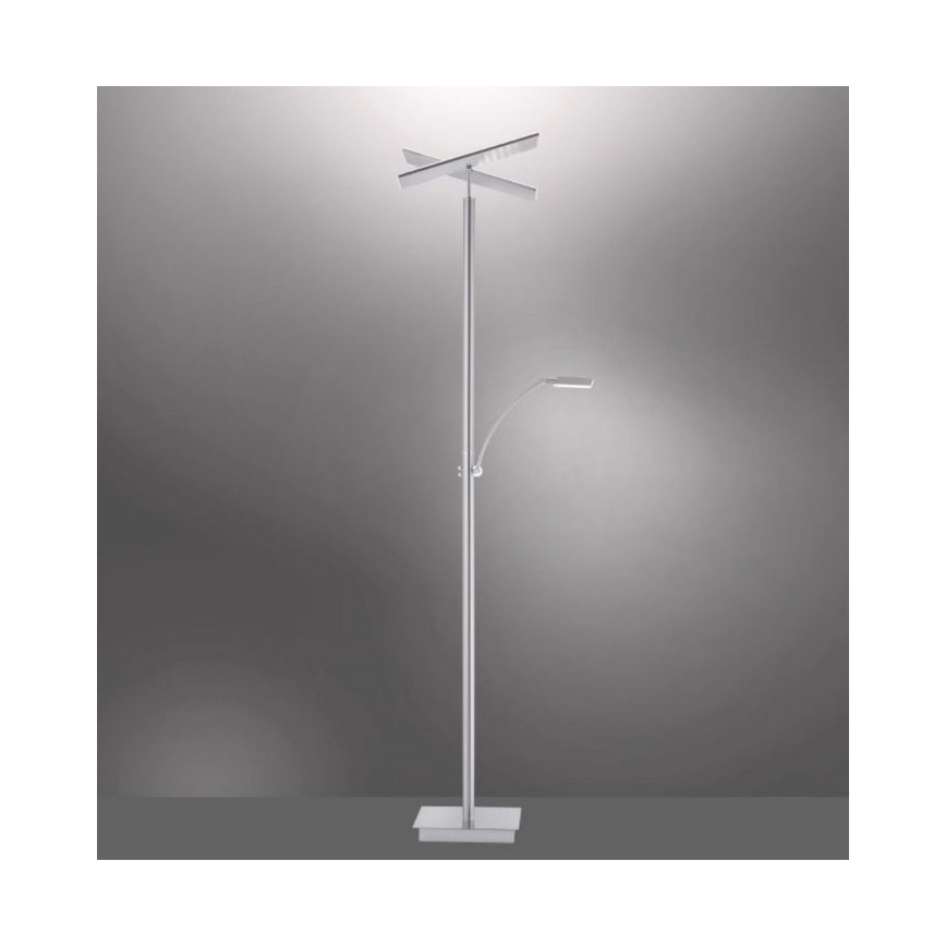 Stojacia lampa s dvoma svetelnými zdrojmi stojí na štvorcovej základni. Horný zdroj má krížový tvar, dolný je menší, výsuvný. Lampa je striebornej farby.